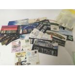 A collection of stamp presentation packs a signed