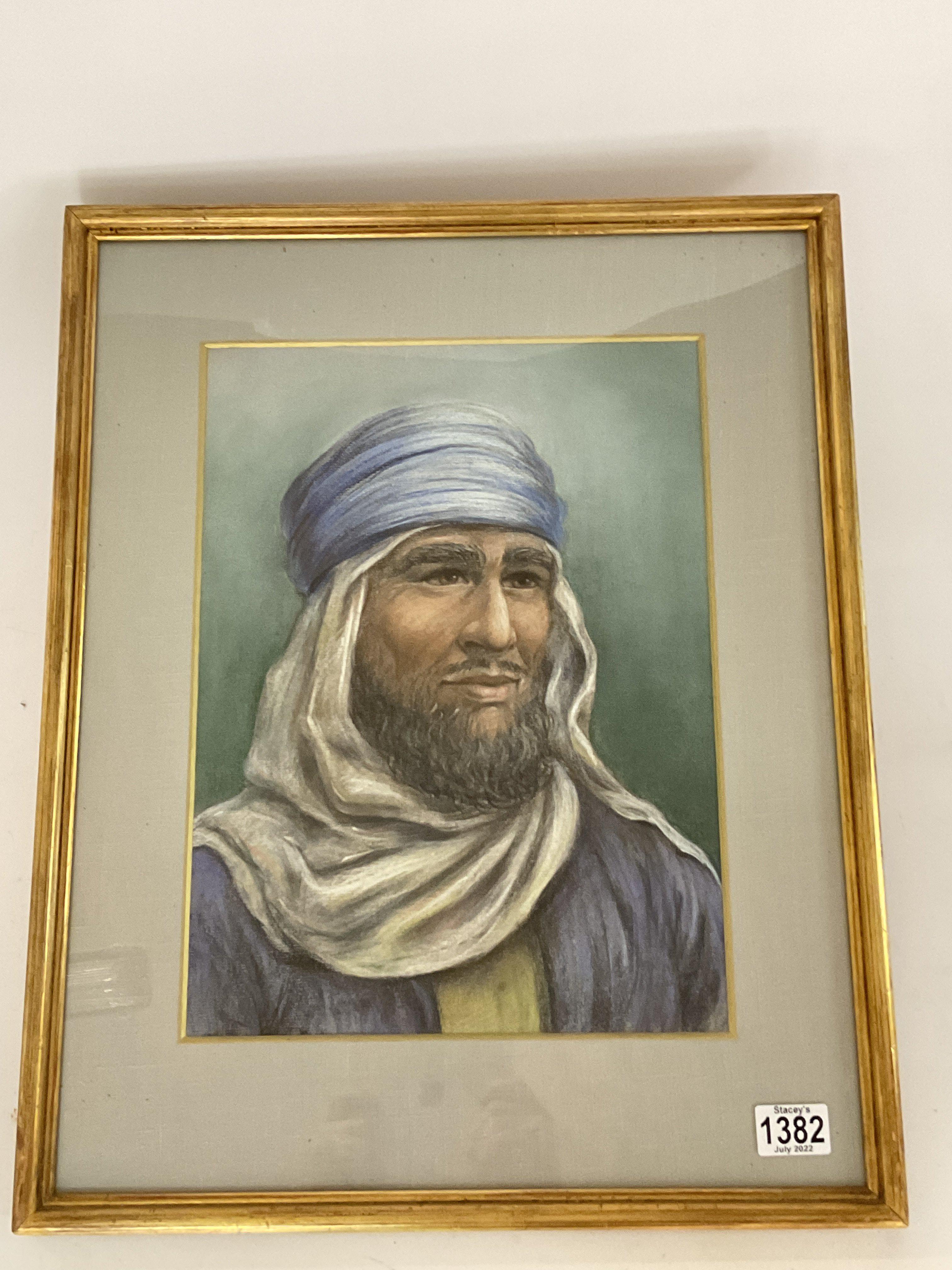 A large gilt framed pastel portrait of an Arab. 46