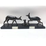 A good Art Deco style set of two bronzed deer and