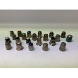 22 various hallmarked Silver thimbles.