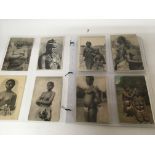 A collection of Edwardian and later postcards stud