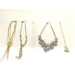 Collection of various necklaces including a restru