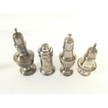 4 hallmarked silver pepper casters. 1891 - 1912 -
