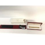 A Cartier gold pen with original certificate of or