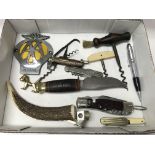 Various corkscrews - sheaf knife, AA badge and cig