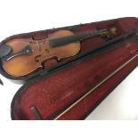 A full size Violin in a fitted case with bow stamp