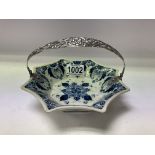 A small delft pottery tin glaze bowl with a white