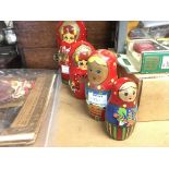 Two Russian painted wood graduating doll sets NO R