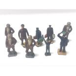 Nine various "O" Gauge lead porters and others