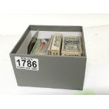 A box containing a collection of Vintage cigarette cards (a lot)