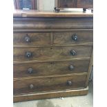 A Victorian Mahogany chest of drawers with a friez
