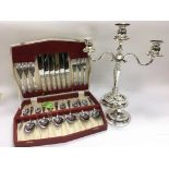 A three branch silver plated candlestick, chamber