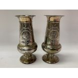 A pair of hallmarked silver weight vases with flut