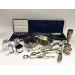 A collection of silver and plated items including