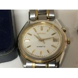 A Gents Seiko bi-metal gold tone and chrome watch