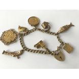 Charm bracelet with 2 1/2 sovereigns attached. App