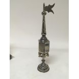 A Jewish silver Spice tower with hanging bells and