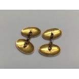 A pair of 9 ct gold cuff links 4.2 grams.