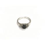 An 18ct white gold, sapphire and diamond set ring,