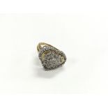 An 18ct gold heart shaped diamond cluster ring, ap