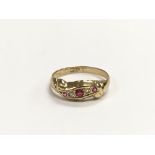 A Victorian 18ct gold, ruby and diamond ring, appr