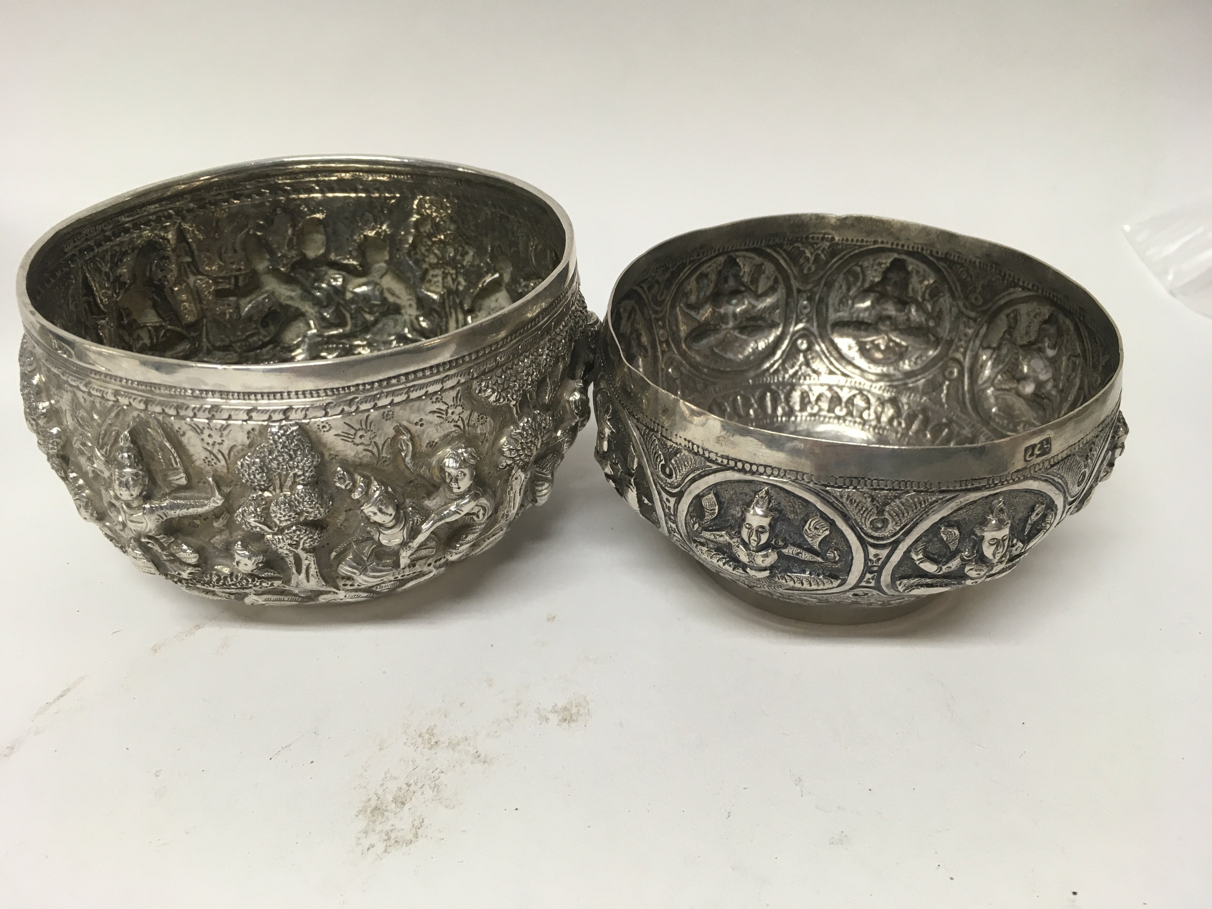 Two Indian white metal bowls with raised deity . - Image 2 of 4