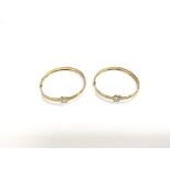 A pair of 9ct gold stone set hoop earrings, approx