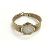 A 9ct gold Garrard ladies bracelet watch with a qu