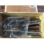 A collection of various old pens and pencils in ol