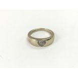 A 9ct gold diamond set heart ring, approx 3g and a