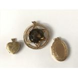 2 9ct gold lockets and smokey quartz pendant. Appr