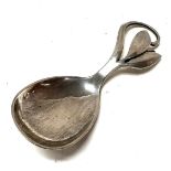 An Arts & Crafts Danish silver caddy spoon with As