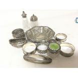 A collection of silver oddments napkin rings a dec