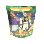 A Boxed Tiger Electronics Power Rangers. Power Fig