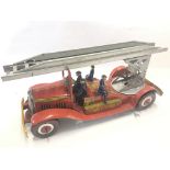 A Mettoy Tinplate Clockwork Fire Engine.