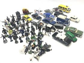 A Collection of Die Cast police Vehicles and Lead Police men including Britains.(Box 1).