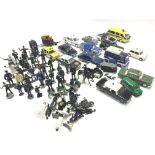 A Collection of Die Cast police Vehicles and Lead Police men including Britains.(Box 1).