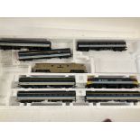 A Box Containing a 00 Gauge Scot Rail Set and one other.