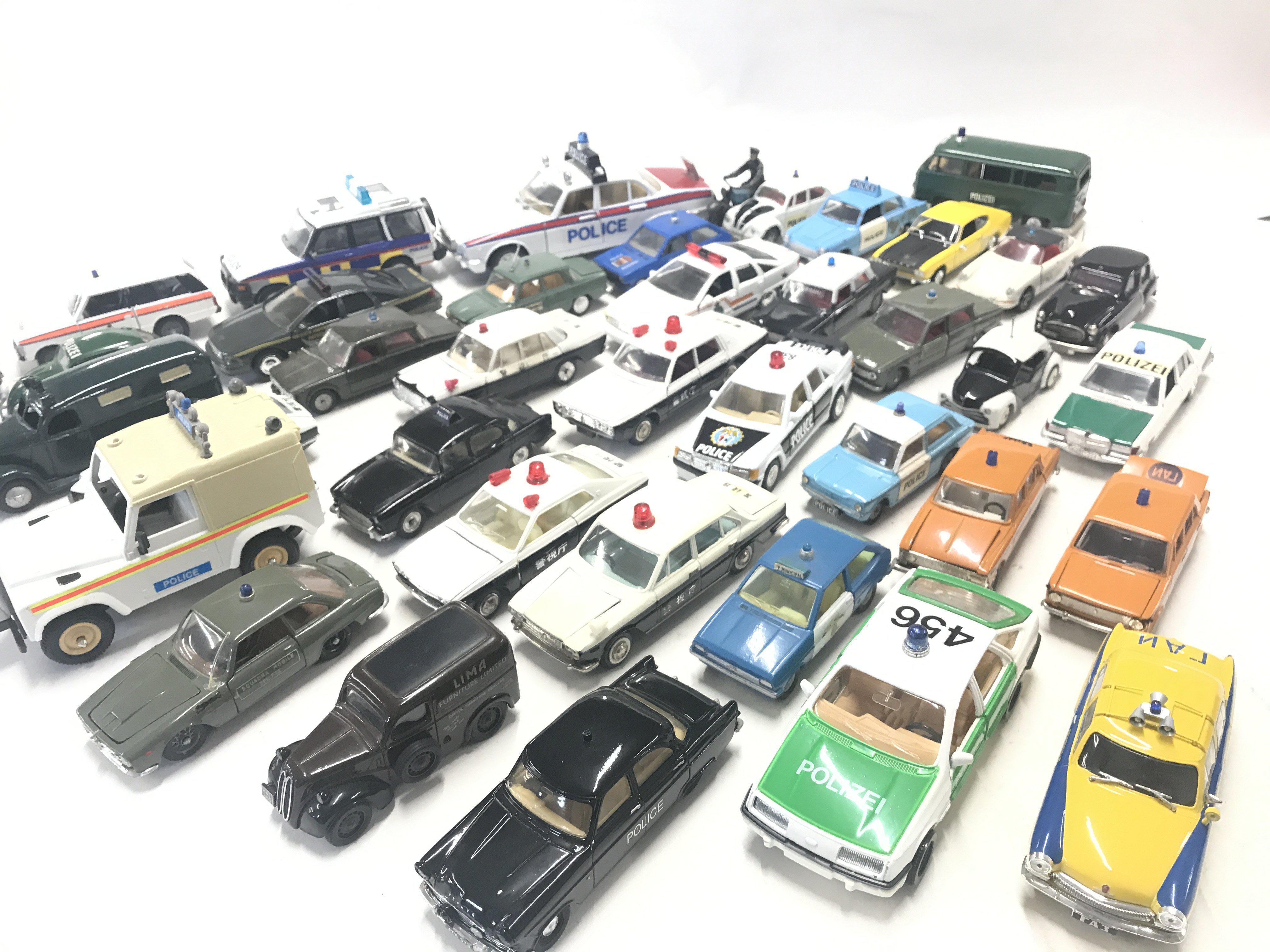 A Collection of Various Die Cast Vehicles. All Police Vehicles and Various makers.(Box 14).