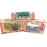 3 Boxed Britains Farming Equipment including a Trailer. A Harvester and a Tipper Cart. Boxes in