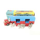 A Boxed Corgi Circus Horse Transporter With Horses #1130. (Box is worn)