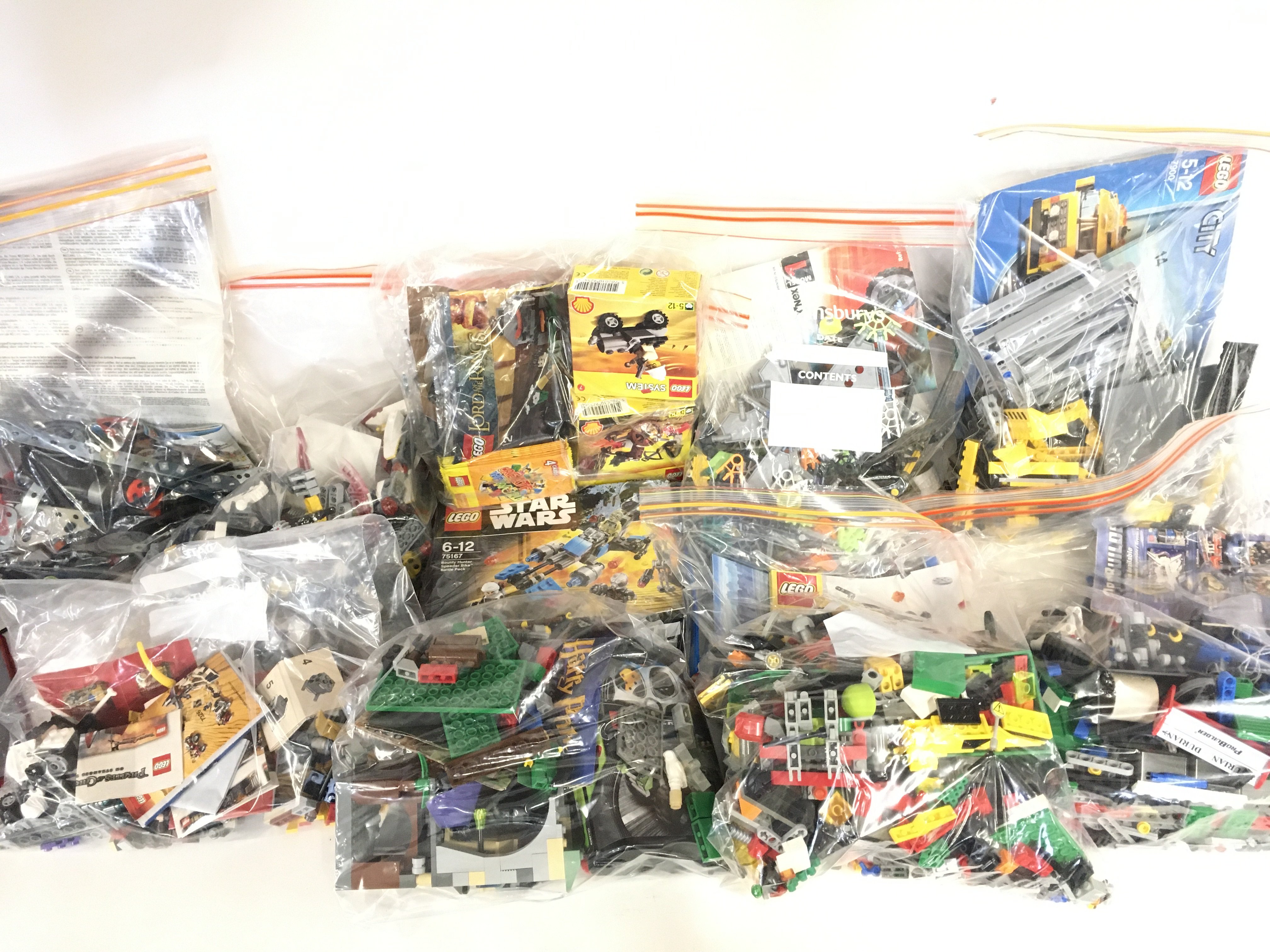 A Box Containing A Collection of Lego including Ha