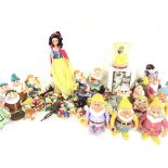 A Collection of plastic Snow White Figures and ite