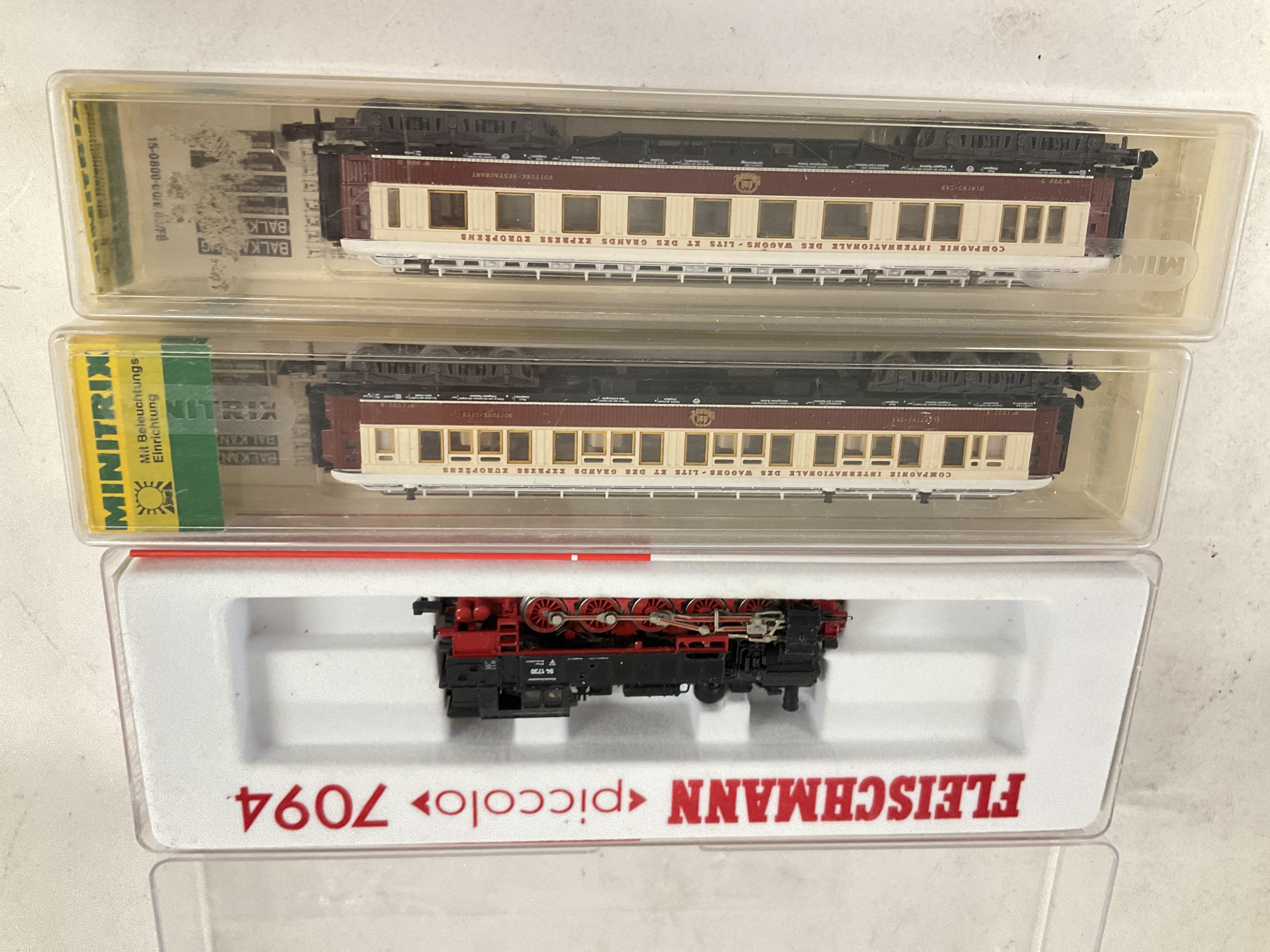 A Boxed Fleischmann N Gauge 0-10-0 tank #7094 With 2 Minitrix Coaches.