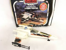 A Boxed Vintage Star Wars Battle Damaged X-Wing.