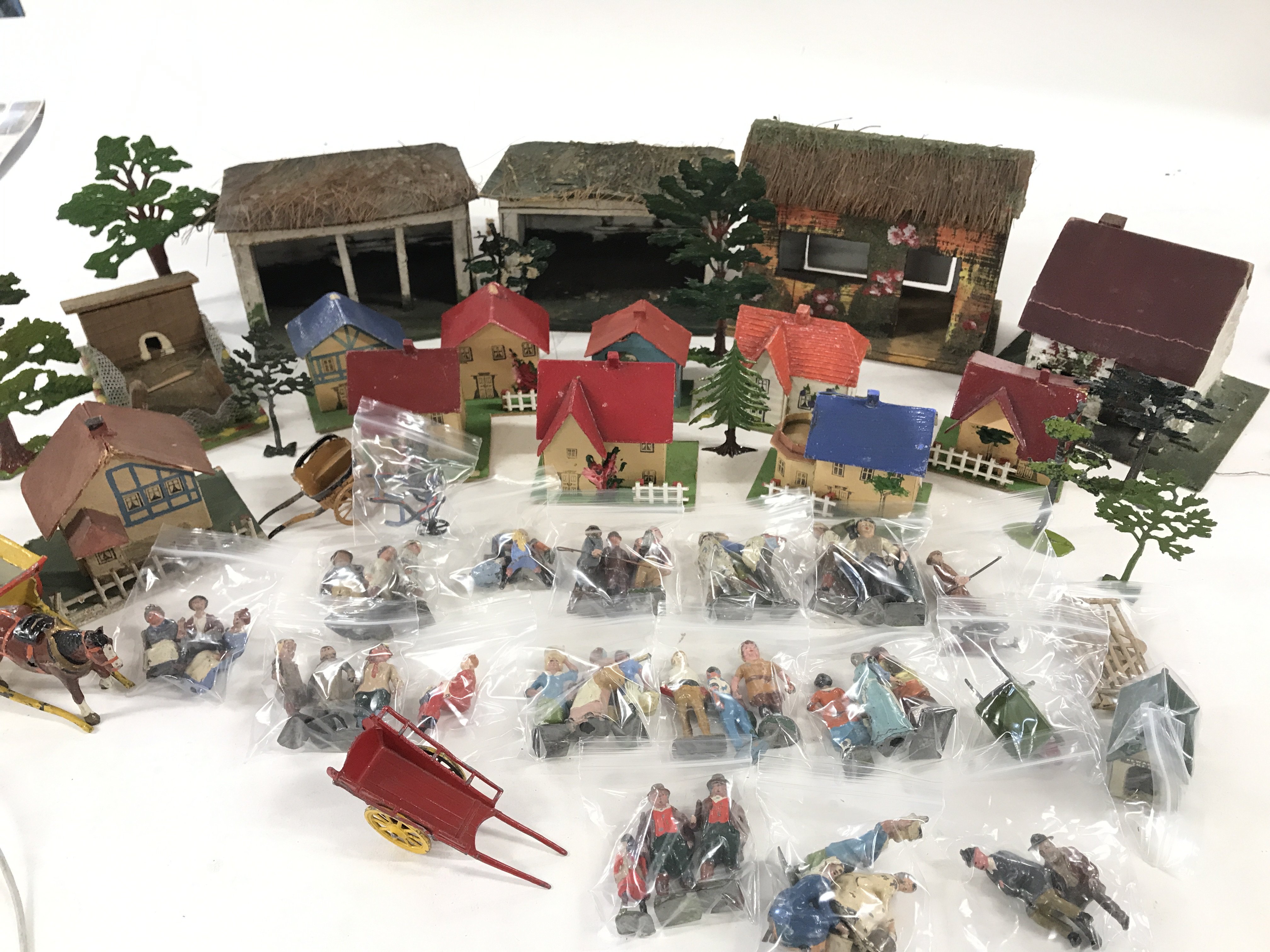 A Collection of Lead Figures and Scratch built Buildings.