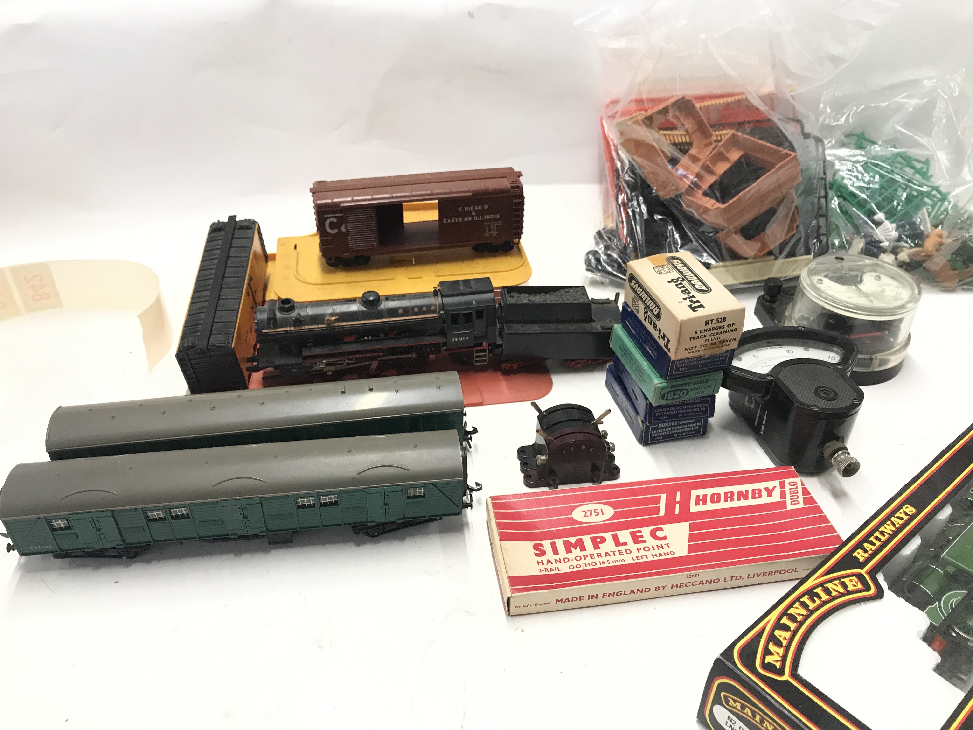 Collection of railway accessories including. Points. buildings. Meters. Mainline locomotive #54154