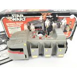 A Boxed Vintage Star Wars Imperial Transporter. By