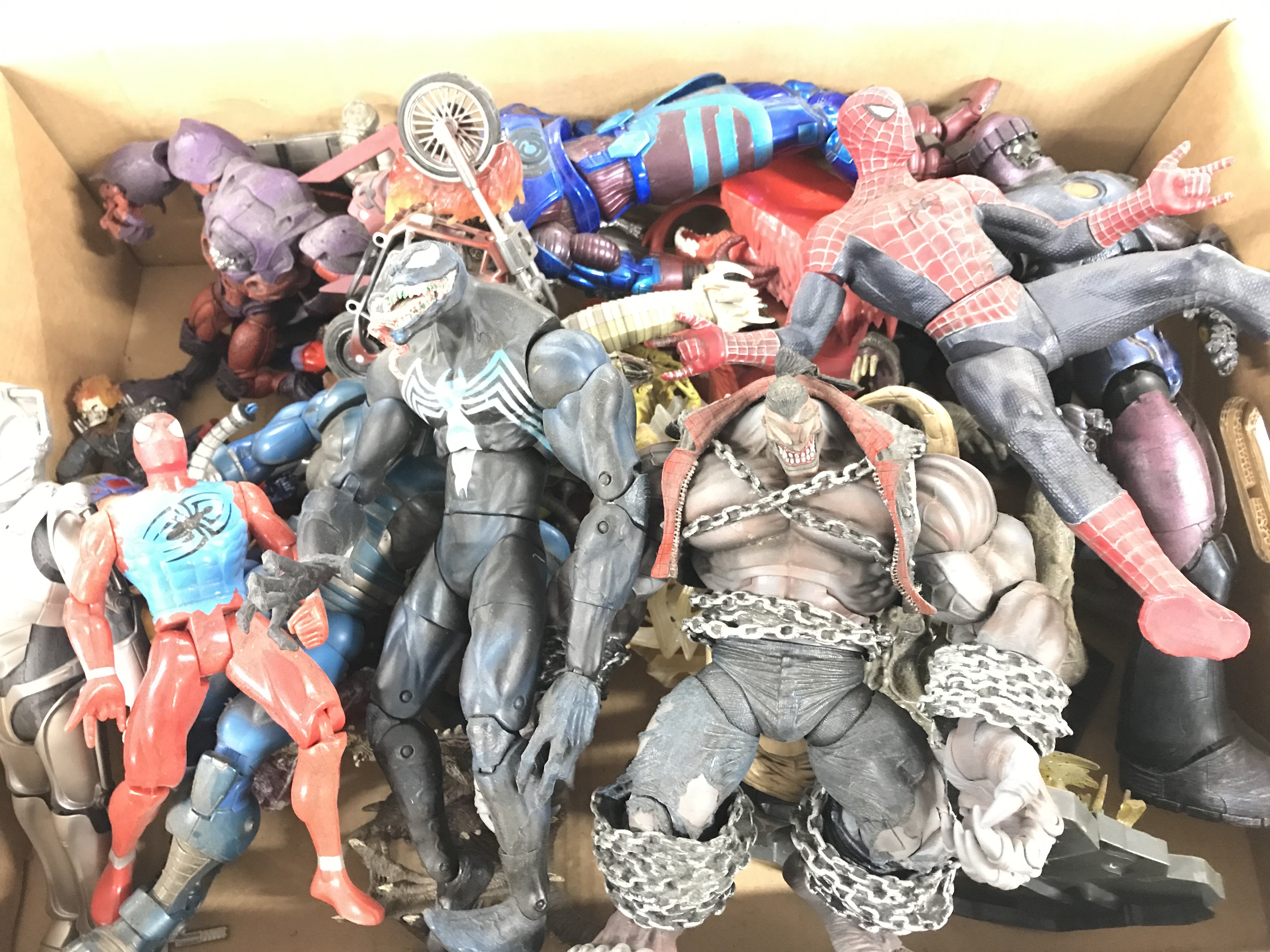 A Box Containing a Collection of Large Marvel and other figures.