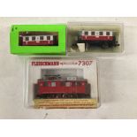 A Boxed Fleischmann Piccolo N Gauge Rack and 2 X Coaches.